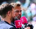 Bild: Tom Weller/dpa
Thomas Müller (links) und Jürgen Klopp hievten das Expertentum während der WM auf eine neue Stufe.