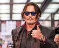 Bild: Alberto Pezzali/Invision via AP/dpa
Johnny Depp spielt in seiner neuen Rolle den Griesgram Ebenezer Scrooge. (Archivbild)