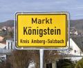 Bild: Petra Hartl
Das Ortschild von Königstein: Der Marktrat befasste sich in seiner jüngsten Sitzung mit mehreren richtungsweisenden Themen – darunter dem geplanten Mischgebiet „Stockäcker“ in Lunkenreuth sowie dem weiteren Ausbau der Glasfaserinfrastruktur.