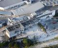 Bild: kyodo/dpa
In einem schwer beschädigten Einkaufszentrum galten noch mehrere Menschen als vermisst.