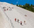 Archivbild: Gerd Huster
Der Aufstieg ist schweißtreibend, das Hinunterlaufen barfuß im Sand eine Riesengaudi: Den Monte Kaolino kann man auch zu Fuß besteigen.