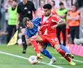 Bild: Harry Langer/dpa
Wiedersehen im Testspiel: Heidenheims Luca Kerber (l) und Luis Díaz vom FC Bayern. (Archivbild)