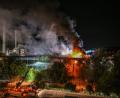Bild: Marius Bulling/onw-images/dpa
Eine Lagerhalle brennt in Ulm.