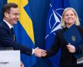Bild: Lars Schröder/TT/TT News Agency/AP/dpa
Die Sozialdemokratin Magdalena Andersson und der konservative schwedische Regierungschef Ulf Kristersson. (Archivbild)