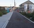 Bild: Richard Braun
Das Baugebiet "Quartier am Brünnlweg" wird durch die Straße "In der Au " erschlossen. Die Straße ist als Ortsstraße gewidmet und als Einbahnstraße angelegt.
