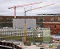 Bild: Daniel Karmann/dpa
Die Bauarbeiten liegen voll im Zeitplan. Zur Spielzeit 2028/2029 wird das Staatstheater im neuen Opernhaus starten.