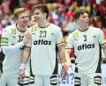 Bild: Sina Schuldt/dpa
Die Vorfreude steigt: Franz Semper, Renars Uscins und Nils Lichtlein fiebern der Heim-WM entgegen. (Archivbild)