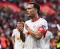 Bild: Federico Gambarini/dpa
David Raum sieht daheim gerade keinerlei Probleme bei RB Leipzig. (Archivbild)