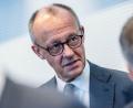 Bild: Michael Kappeler/dpa
Merz weist die SPD-Vorwürfe erneut zurück.