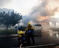 Bild: Paul Bersebach/The Orange County Register/AP/dpa
Die Flammen haben mehrere Häuser zerstört oder beschädigt.