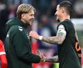 Bild: Florian Wiegand/dpa
Niclas Füllkrug (l) sieht die Debatte um ein mögliches DFB-Comeback entspannt.