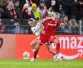 Bild: Harry Langer/dpa
Elisa Senss (l, Real Madrid) in Aktion gegen Pernille Harder (FC Bayern München).