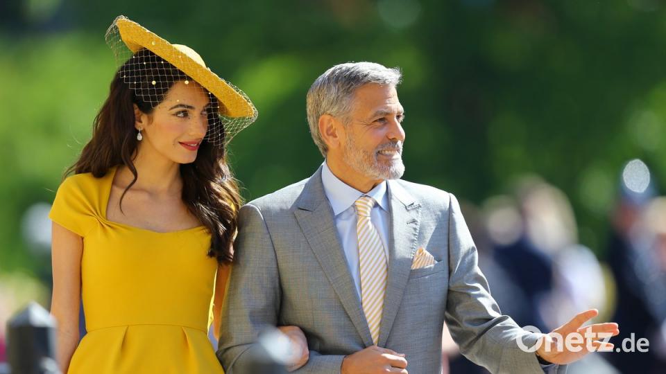 Amal Clooney und George Clooney kommen zur St.-Georgs-Kapelle. Prinz Harry of Wales heiratet Meghan Markle. Foto: Gareth Fuller/PA Wire/dpa