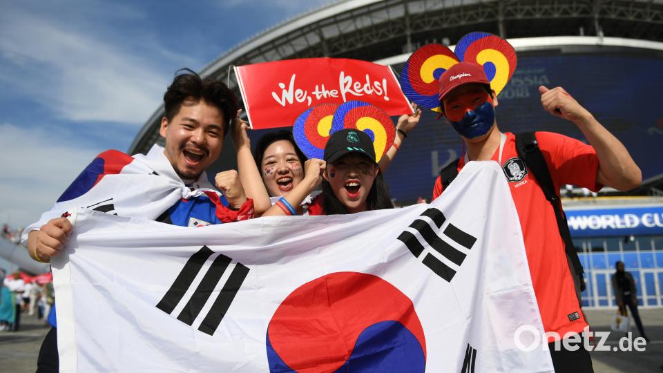 Südkorea  gegen Deutschland: Die Fans bereiten sich auf ein spannendes Spiel vor. Andreas Gebert/dpa