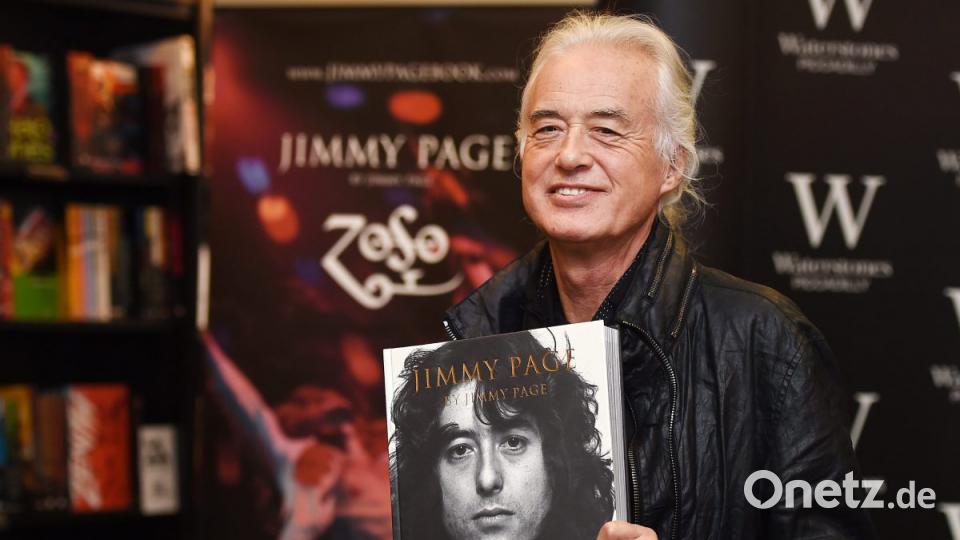 Jimmy Page, britischer Gitarrist und Gründer von Led Zeppelin, präsentiert 2014 sein Buch "Jimmy Page - Zoso". Bild: Andy Rain/EPA/dpa