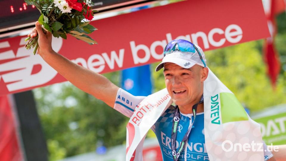 Andreas Dreitz aus Lichtenfels hat erstmals den Triathlon-Klassiker in Roth gewonnen. Bild: Daniel Karmann/dpa