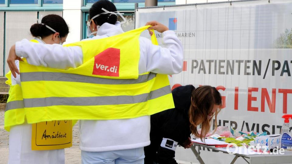 Warm anziehen für den Protest - und wenn es mit einer Warnweste ist. Bild: Stephan Huber