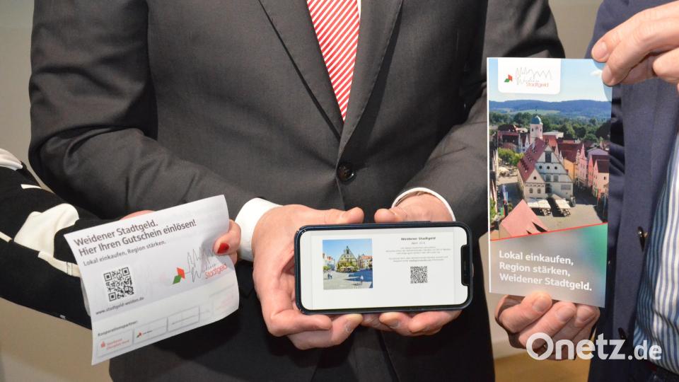 Digital oder auf Papier: Mit dem Weidener Stadtgeld will das Stadtmarketing Weiden den lokalen Einkauf in der Region stärken. Bild: Kunz
