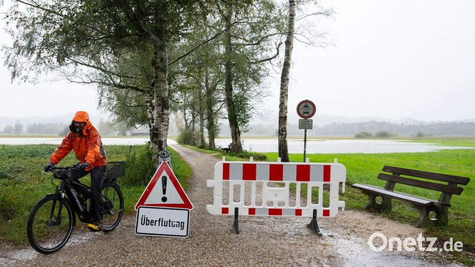 In Bayern bringen die Regenmassen mancherorts Überflutungen mit sich. Bild: Lennart Preiss/dpa