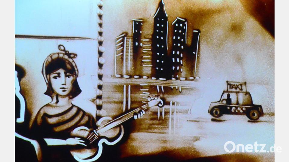 Diese Sandmalerei zeigt New York und was die Weltstadt bietet. Bild: Kunz