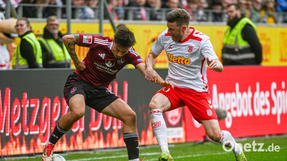 Aufstiegsanwärter Nürnberg und Tabellenschlusslicht Regensburg zeigten ein umkämpftes Match. Bild: Armin Weigel/dpa