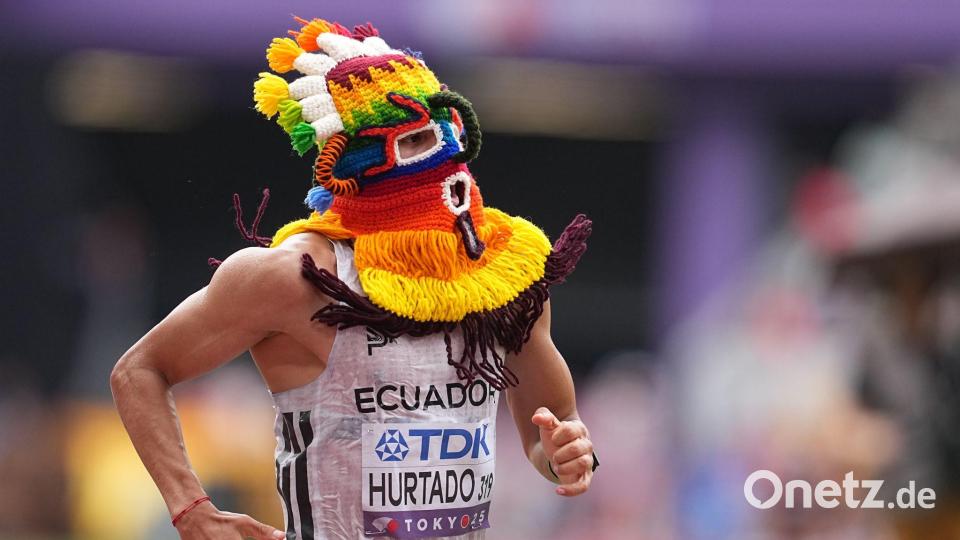Lief mit Maske ins Ziel: David Hurtado. Bild: Michael Kappeler/dpa