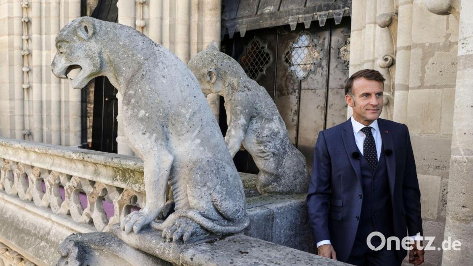 Nach dem Brand im April 2019 versprach Frankreichs Präsident Emmanuel Macron, die Kathedrale in nur fünf Jahren wiederaufzubauen. Nun nahm er an der Einweihung teil. Bild: Yoan Valat/Pool EPA/AP/dpa