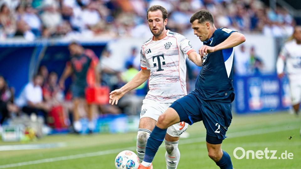 Laufen, kämpfen, verteidigen: Auch das zählt zu Kanes Qualitäten. Bild: Uwe Anspach/dpa
