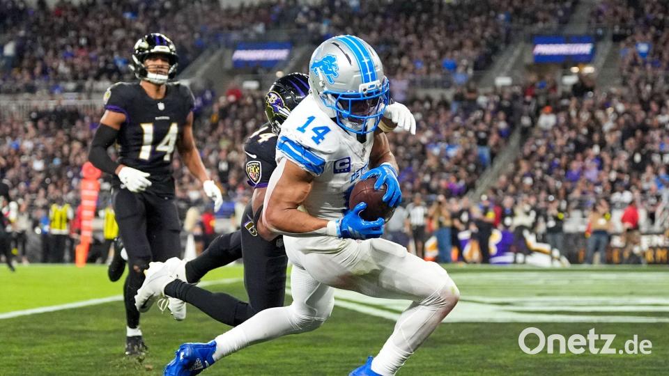 Amon-Ra St. Brown fing seinen vierten Touchdown der Saison. Bild: Stephanie Scarbrough/AP/dpa