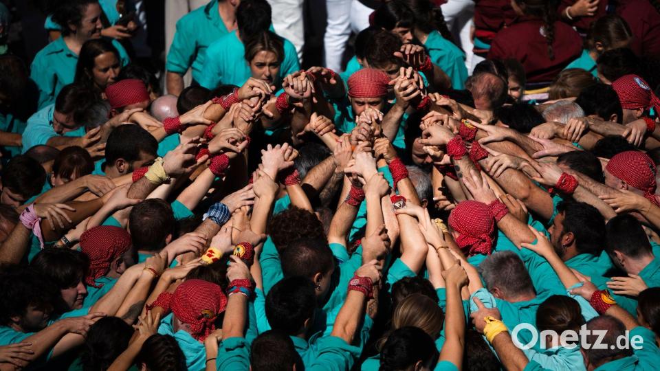Auftritt der „colles de castellers“ (Menschenpyramiden-Gruppe) während des traditionellen Festes von La Merce in Barcelona. Bild: Lorena Sopêna/EUROPA PRESS/dpa