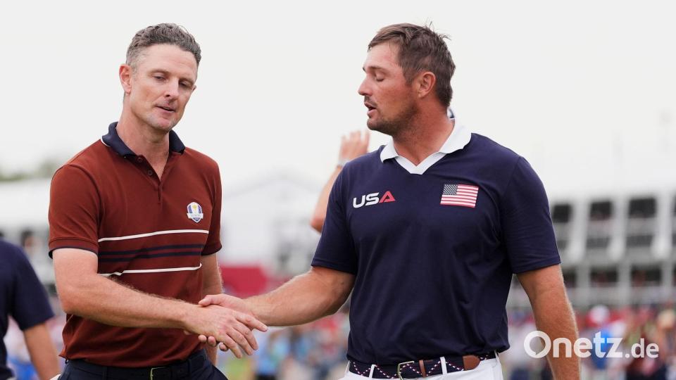 Zwischen Justin Rose (links) und Bryson DeChambeau wurde es vor dem abschließenden Handschlag emotional. Bild: Lindsey Wasson/AP/dpa