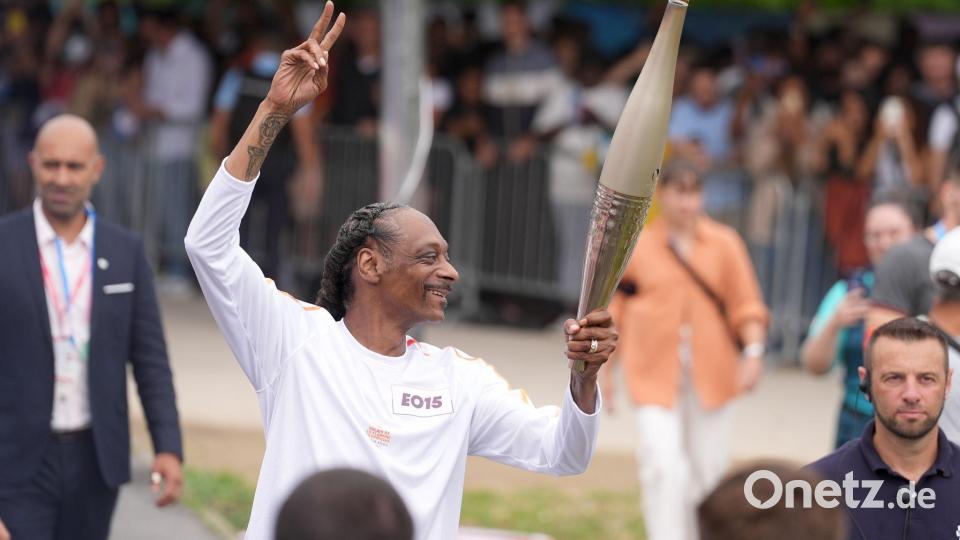Auch beim Fackellauf in Paris war Snoop Dogg Bild: Marcus Brandt/dpa
