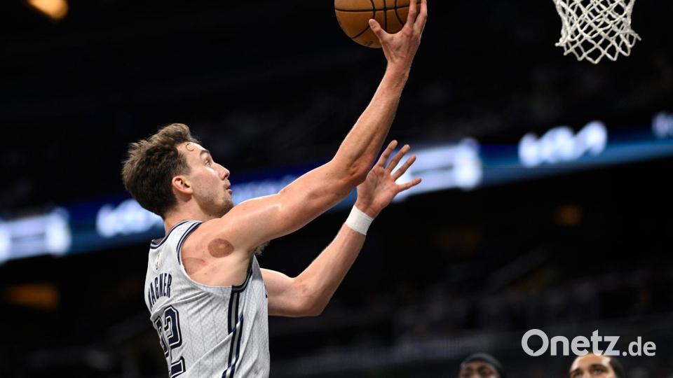Franz Wagner und die Magic spielen bald in Berlin. Bild: Phelan M. Ebenhack/AP/dpa