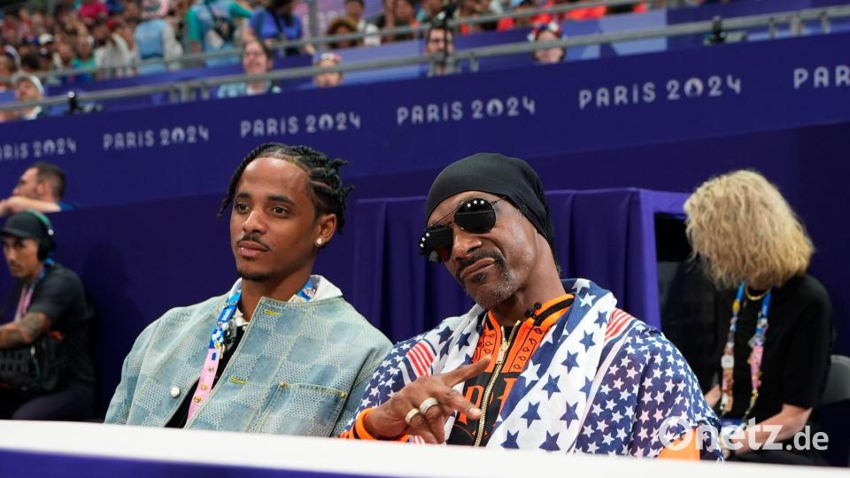 Snoop Dogg (r) sorgte für hohe TV-Quoten bei NBC. Bild: Lindsey Wasson/AP/dpa