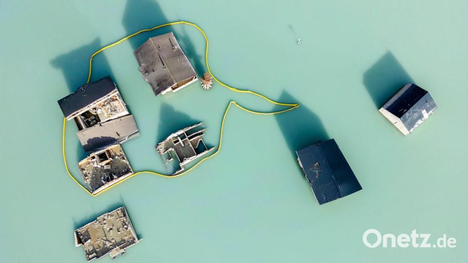 Blatten/Wallis: Vier Monate nach Erdrutsch – Luftaufnahme zeigt Häuser im überfluteten Dorf. Bild: Michael Buholzer/KEYSTONE/dpa