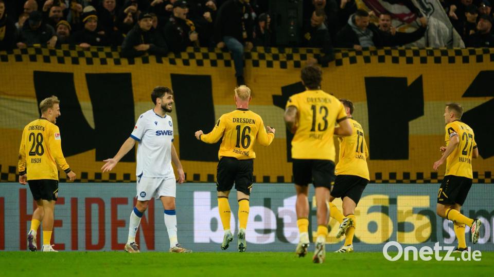 Der Dresdner Nils Fröling jubelt nach seinem Tor zum 1:0. Bild: Robert Michael/dpa