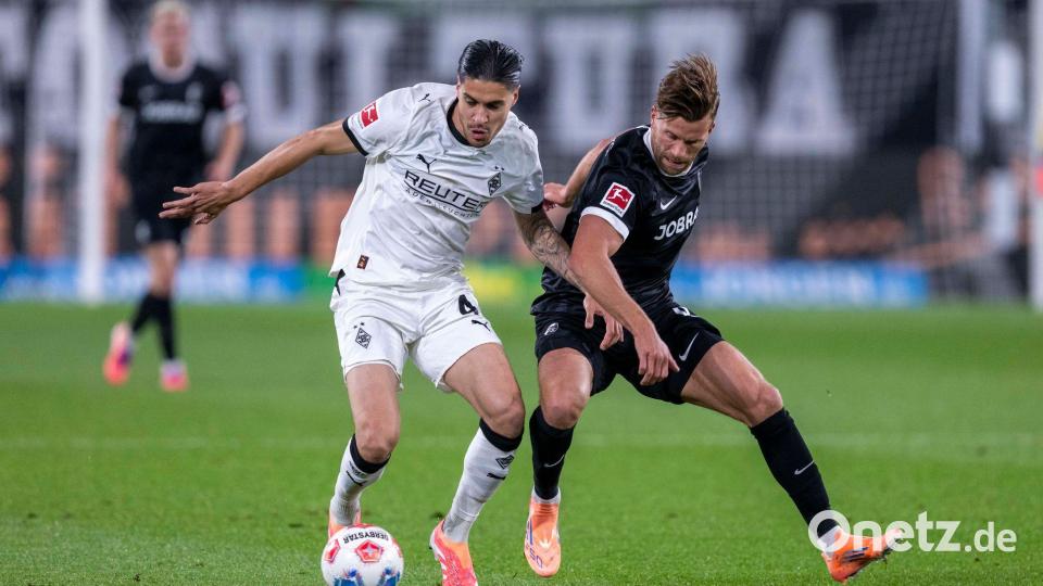 Gladbach und Freiburg lieferten sich packende Zweikämpfe. Bild: David Inderlied/dpa