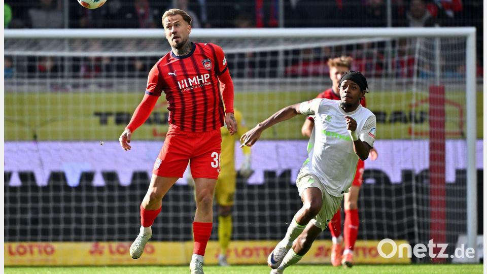 Niklas Dorsch und Heidenheim holen einen Punkt gegen Bremen. Bild: Jan-Philipp Strobel/dpa