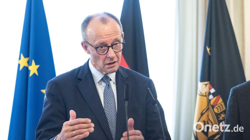 Merz sieht Chancen, aber auch Risiken der KI. Bild: Marijan Murat/dpa