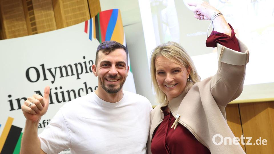 Kanute Sideris Tasiadis und Ex-Skirennfahrerin Hilde Gerg setzen auf Olympia in München. Bild: Karl-Josef Hildenbrand/dpa