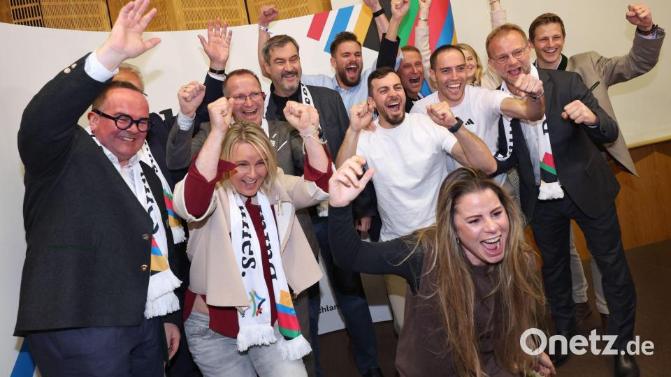 Jubel nach einem klaren Votum: Die Befürworter freuen sich über das Ja zur Münchner Olympia-Bewerbung. Bild: Karl-Josef Hildenbrand/dpa