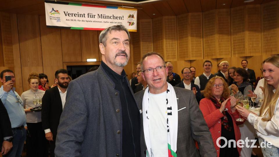 Ministerpräsident Markus Söder (l) und Landes-Sportverbandschef Jörg Ammon sehen Münchens Bewerbung international mit den besten Chancen. Bild: Karl-Josef Hildenbrand/dpa