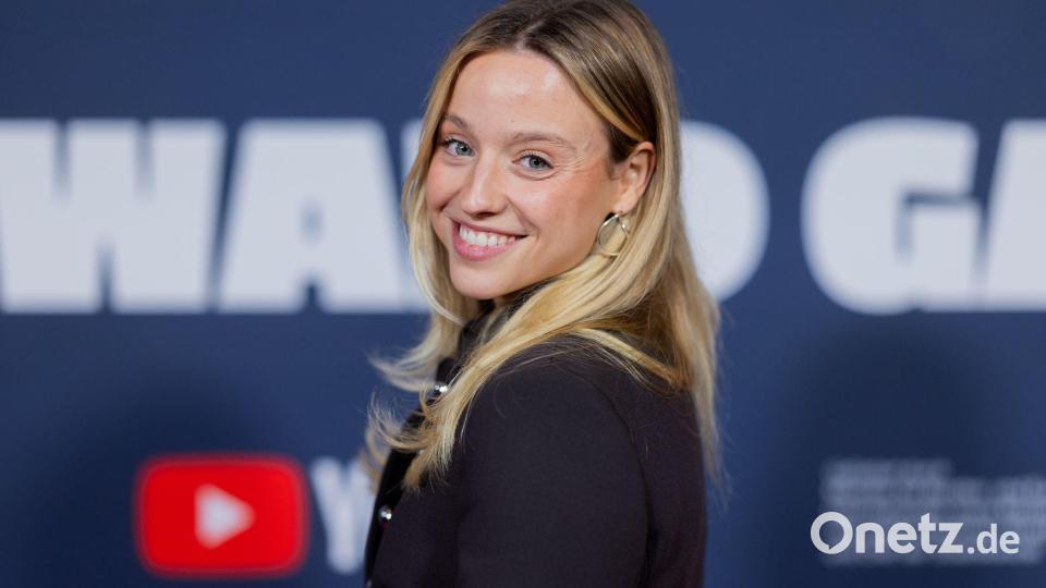 Running-Influencerin Paula Enzweiler erläuft sich den „Sport“-Preis. Bild: Rolf Vennenbernd/dpa