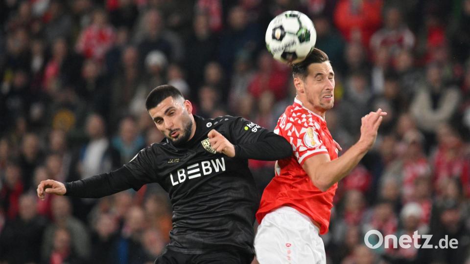 Schenkten sich nichts: Deniz Undav und Dominik Kohr im Luftduell. Bild: Torsten Silz/dpa