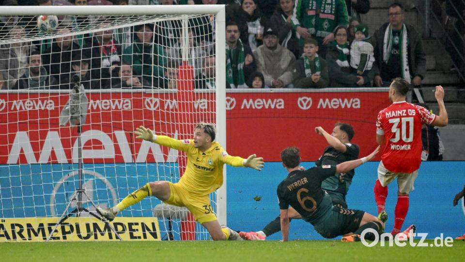 Silvan Widmer trifft zur Mainzer Führung. Bild: Torsten Silz/dpa