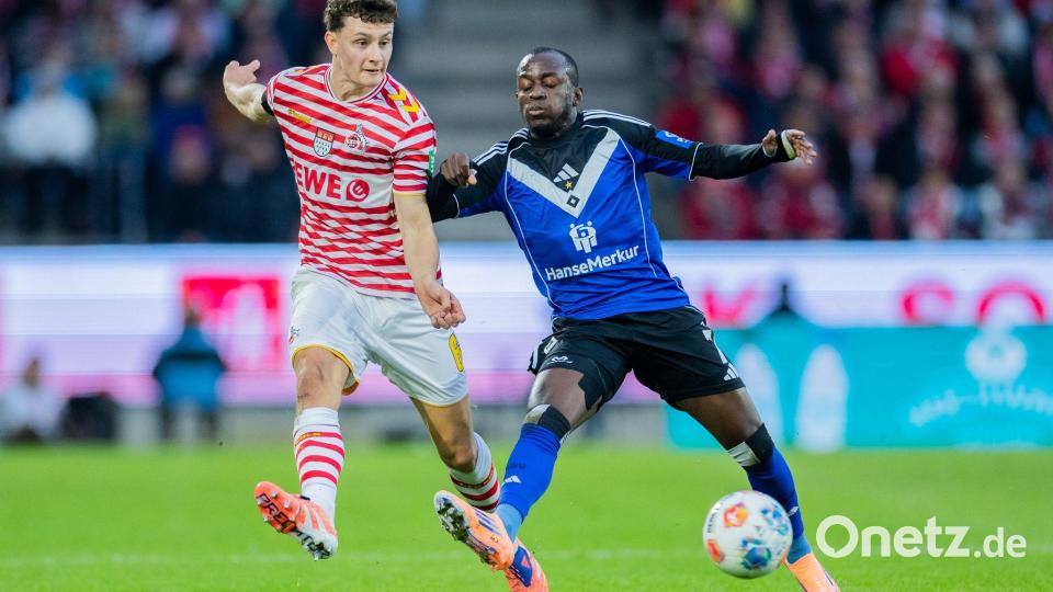 Jean-Luc Dompé (r.) traf in seinem 100. Pflichtspiel für den HSV Bild: Rolf Vennenbernd/dpa
