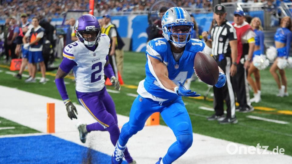 Detroits Amon-Ra St. Brown (r) blieb gegen die Vikings ohne Touchdown. Bild: Paul Sancya/AP/dpa