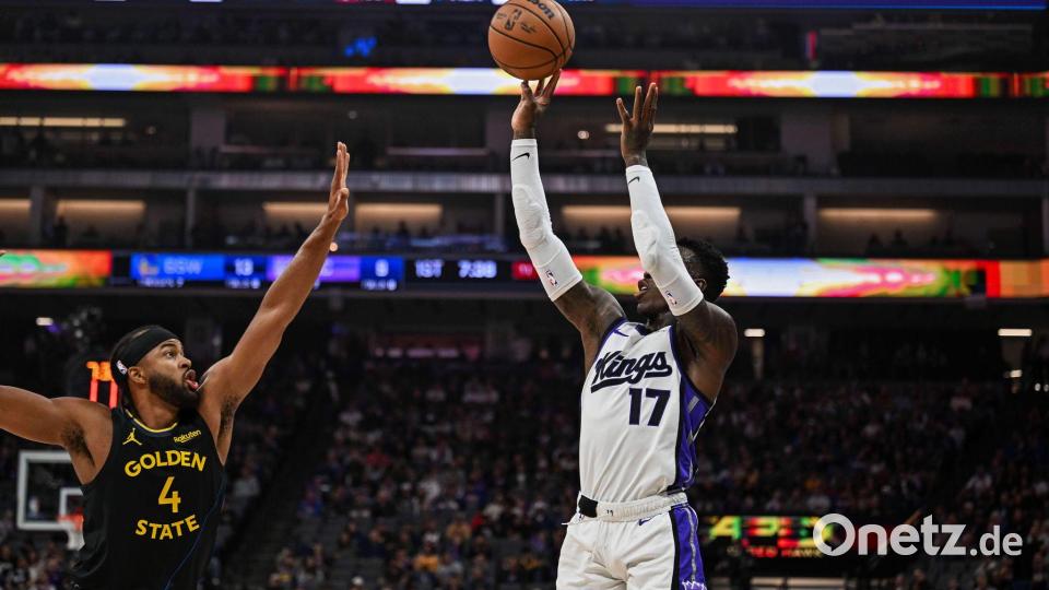 Dennis Schröder (rechts) steigerte sich nach der Pause und trug am Ende 18 Punkte zum Kings-Sieg bei. Bild: Justine Willard/AP/dpa