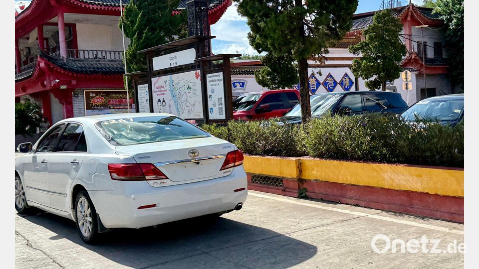 Die meisten Autos in der dubiosen Golden Triangle Special Economic Zone haben nicht einmal Nummernschilder. Bild: Carola Frentzen/dpa