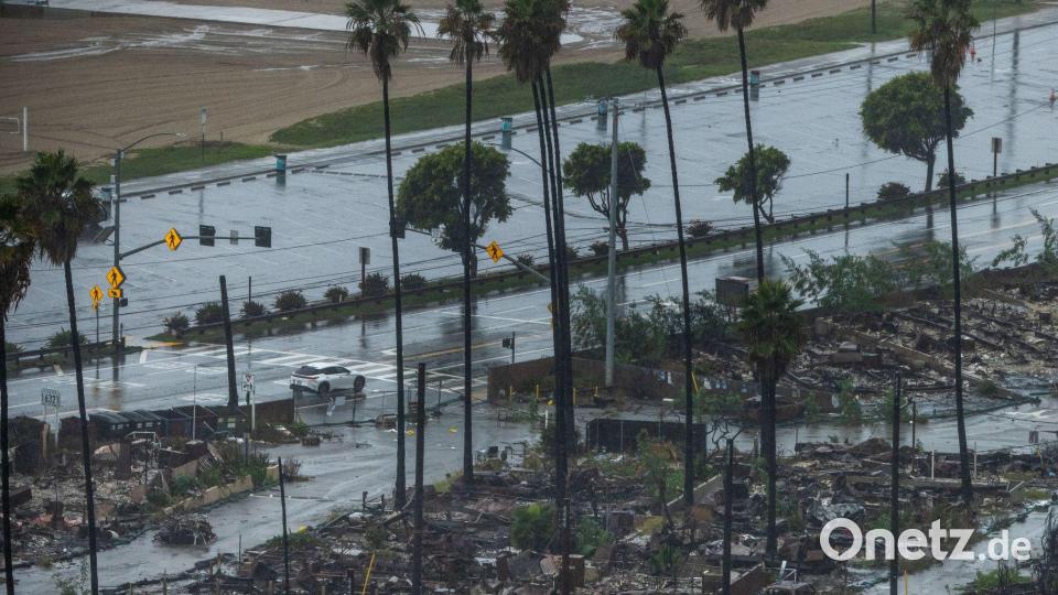 Die Behörden warnten von Sturzfluten und Überschwemmungen. Bild: Ethan Swope/AP/dpa